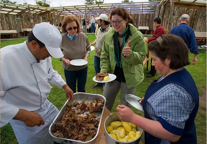 Guests enjoying Patagonian lamb and local sides